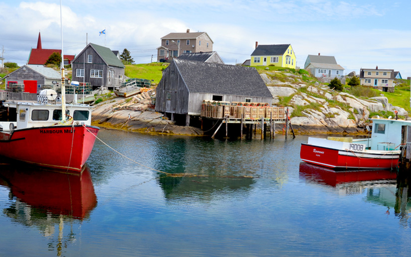 Photo of a fishing village and boats in Nova Scotia